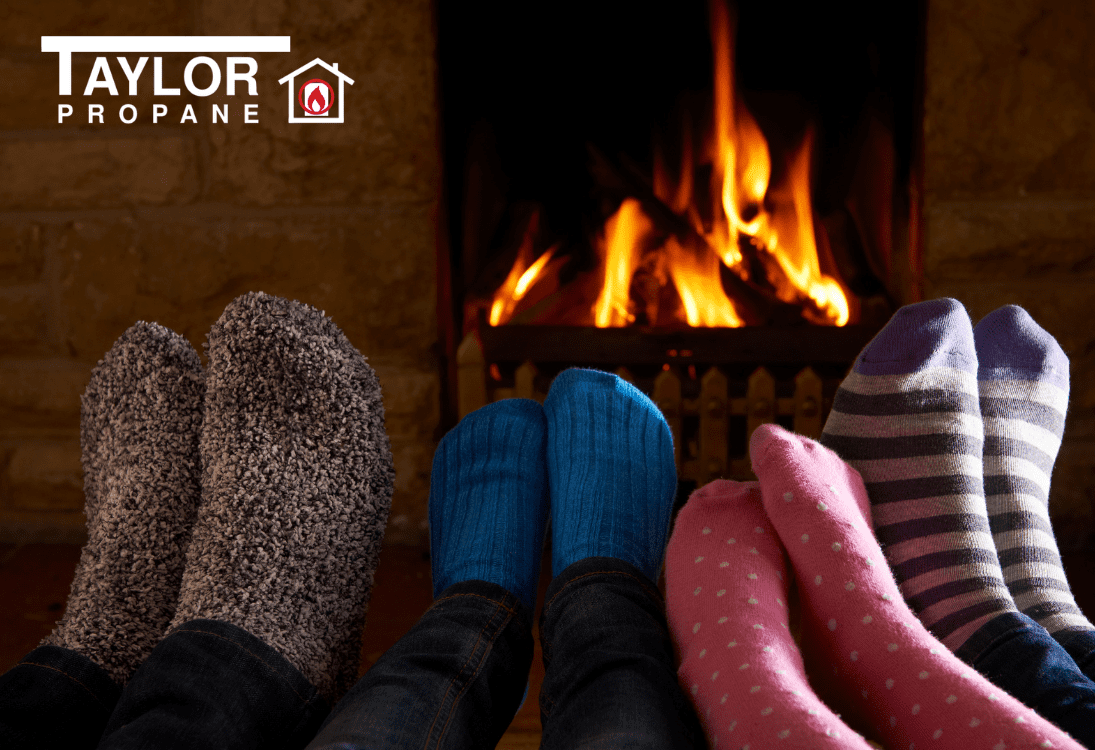 A group of people that are sitting in front of a fireplace.